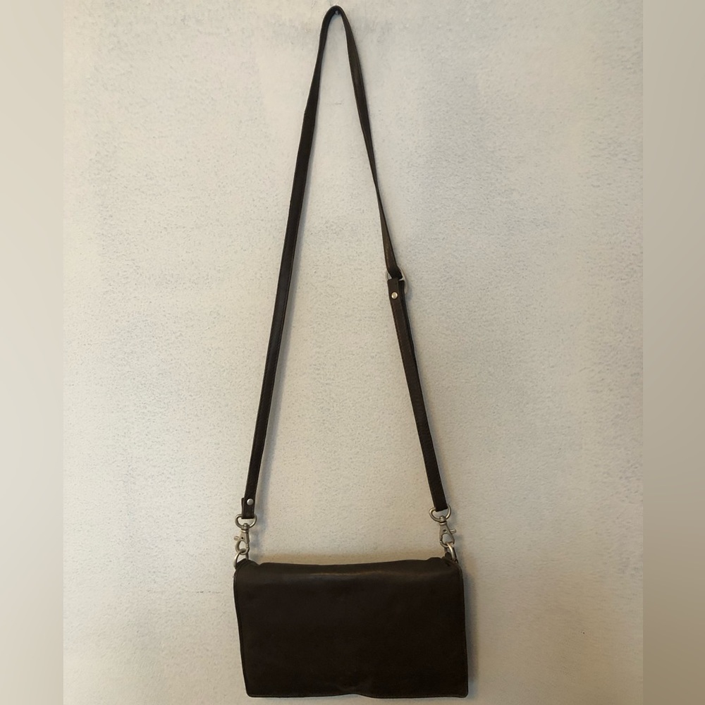Brown leather wallet purse with removable strap.